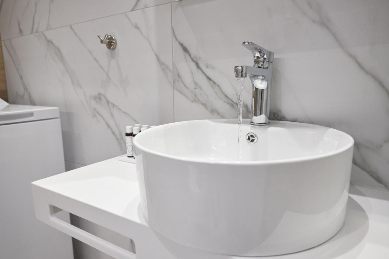 Oisymi Luxury Studios Nea Peramos  Luaran gambar